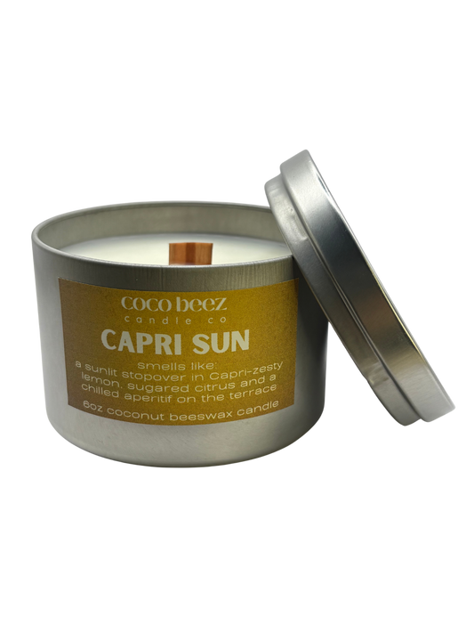Coco Beez candle in a metal tin labeled 'Capri Sun'