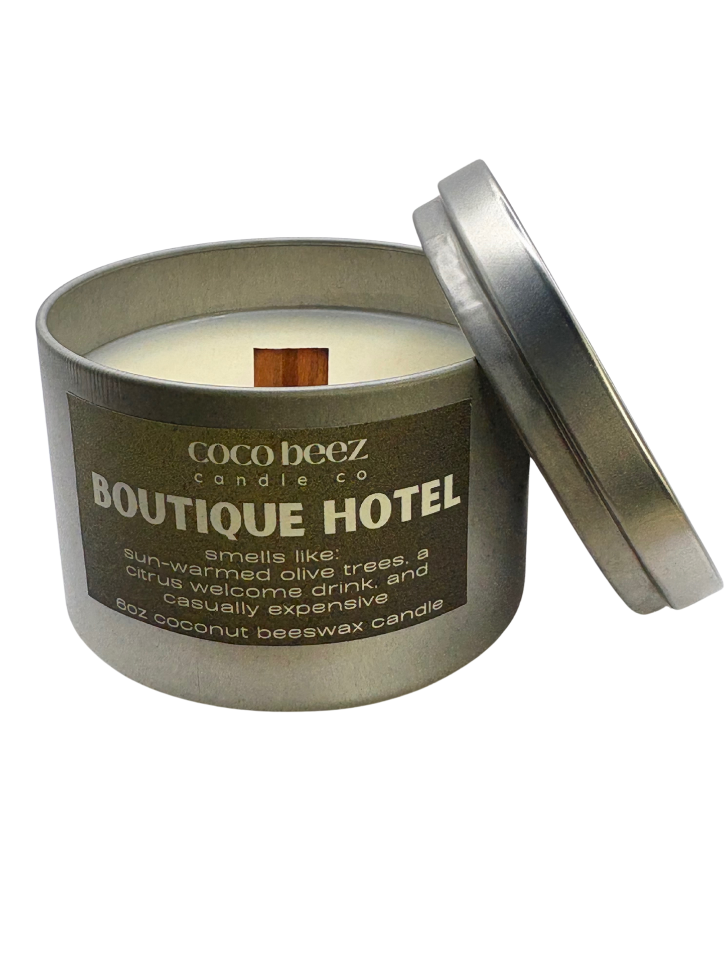 Coco Beez candle in a metal tin labeled 'Boutique Hotel' 