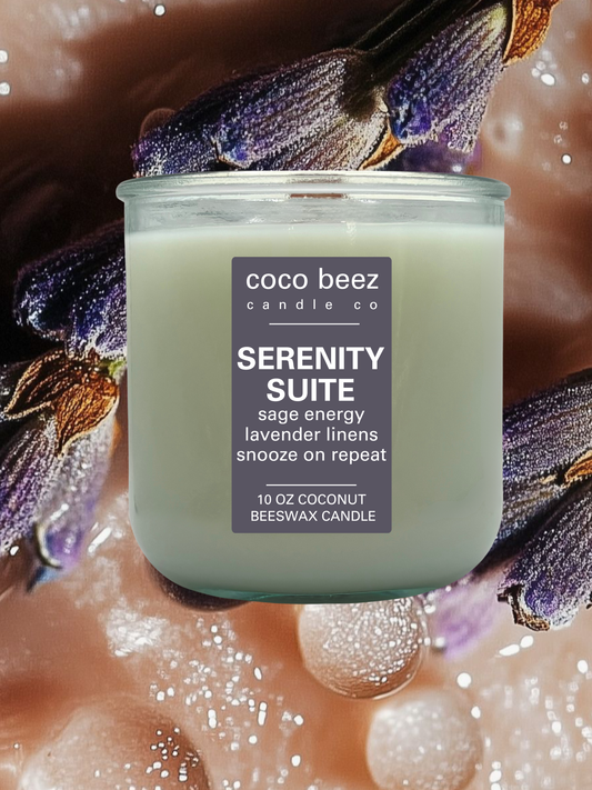 A 10 oz coconut beeswax candle by Coco Beez Candle Co. in a clear glass jar, labeled 'serenity suite'.