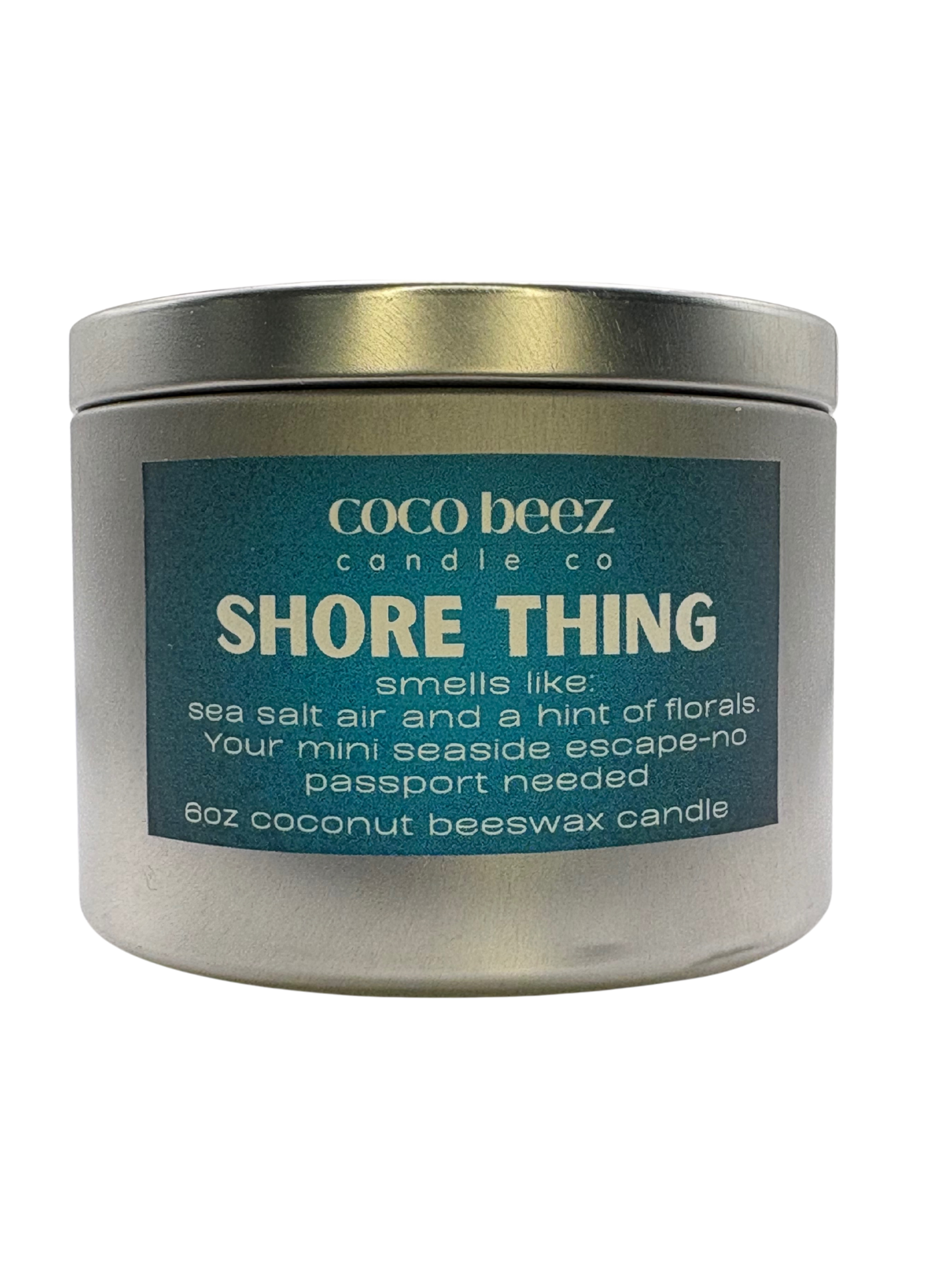 Travel Tin candle with Shore Thing on the label